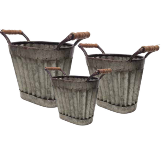 Three metal buckets with handles on a white background